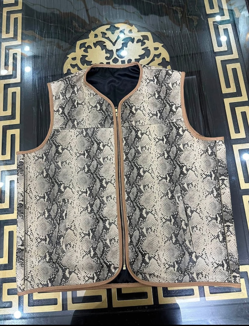 Snakeskin patterned vest with tan leather trim — Aztecs Custom Cuts